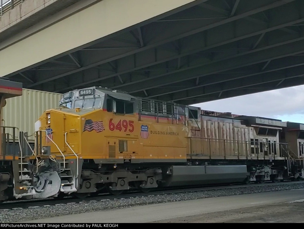 UP 6495 3rd motor on east bound manifest at the UP Green River Yard Wyoming 